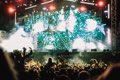 Crowd at an outdoor electronic music concert at night